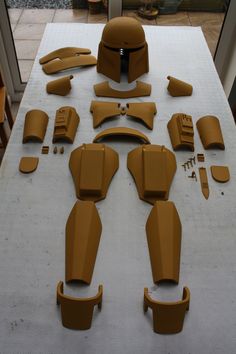 the motorcycle parts are laid out and ready to be put into their respective paint job