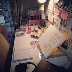 an open book sitting on top of a desk