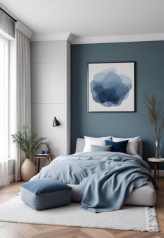 a bedroom with blue walls and wooden floors