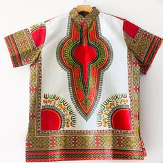 This shirt is great for any occasion and it is made with 100% Cotton Ankara fabric. Care Instructions: Machine Wash and Air Dry or Dry Clean Only African Dashiki Shirt Mens Fashion, Dashiki Print Shirt, Dashiki Hoodie, Men’s African Shirts, Ankara Maxi Dress, Dashiki Shirt, Infinity Dress, Ankara Fabric, Fashion Night