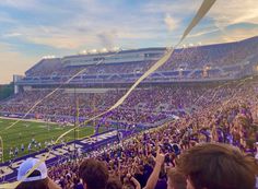 a football stadium filled with people and fans