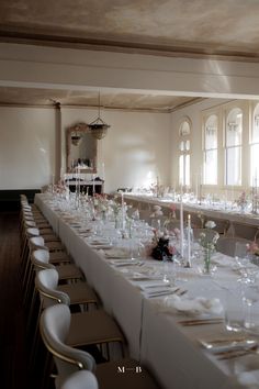 a long table is set up for a formal function