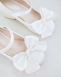 This flower girls satin block heels adorn with a charming satin bow detail, charming and elegant shoes designed for little princess for birthday party, holiday party, wedding party, flower girls, quinceanera shoes, and other special occasions. The satin material adds a sophistication to the overall look, making them perfect for formal occasions.DETAILS:HEEL HEIGHT: 2 inchesUPPER: Synthetic upper and liningMATERIALS: Manmade outsoleORIGIN: Imported Elegant Closed Toe Shoes For First Communion, Elegant Closed Toe Wedding Shoes For First Communion, Spring Wedding Shoes With Satin Bow And Round Toe, Spring Wedding Shoes With Satin Bow, Wedding Shoes With Bow And Round Toe, Closed Toe Wedding Shoes With Satin Bow, Closed Toe Wedding Shoes With Bow, White Wedding Shoes With Satin Bow And Round Toe, White Closed Toe Wedding Shoes With Satin Bow