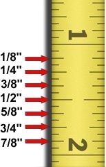 a yellow and red measuring ruler with the words, 1 / 8 inches on it