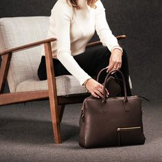 The Lena briefcase embodies elegance and practicality.

Its versatile design makes it ideal for workdays or business trips. It's the perfect companion for women looking for a quality accessory with timeless style.

This briefcase embodies the perfect combination of a slim, compact format and spacious storage capacity, offering dedicated space for your laptop while allowing you to organize your personal belongings efficiently.

lundi is committed to creating quality products that reflect the styl Personal Belongings, Leather Briefcase, Personalized Accessories, Active Women, Business Travel, Leather Working, Full Grain Leather, Timeless Style, Laptop Bag