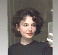 Very Short Formal Hairstyles, Pixie For Double Chin, Curly Short Hair Middle Part, Super Curly Pixie Haircut, "bixie" Haircut 2022 Wavy, Curly Bixie Haircut Girl, Curly 90s Haircut, Wavy Queer Haircut, Short Layered Hair With Curtain Bangs Curly