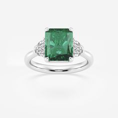 10x8mm Radiant Cut Created Emerald and 5/8 ctw Lab Grown Diamond Three-Stone Engagement Ring 14K White Gold Elegant Three Stone Emerald Ring In White Gold, Elegant White Gold Emerald Ring With Three Stones, Elegant White Gold Emerald Three-stone Ring, Elegant White Gold Emerald Three Stone Ring, Luxury Emerald Ring With Three Stones And Radiant Cut, Luxury Three Stone Radiant Cut Emerald Ring, Modern Emerald Cut Emerald Ring With Accent Stones, Luxury Radiant Cut Three Stone Emerald Ring, Luxury Three Stone Asscher Cut Emerald Ring