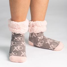 Wrap your feet in comfort and style in Pudus Slipper Socks. With all-encompassing softness, Pudus provides cozy comfort with every step. Featuring extra-fluffy sherpa lining, non-slip grippers, and sizes for everyone, Pudus Slipper Socks are a cozy staple for any wardrobe. Our new Pastel Sherpa Collection features dyed faux-fur in soft pink and lavender tones. Wrapping Slipper Socks, Cold Winter Morning, Pink And Lavender, Classic Slippers, Winter Morning, Slippers Cozy, Comfort And Joy, Everyday Luxuries, Slipper Socks