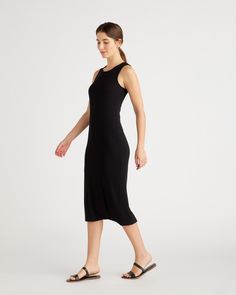 This sleeveless, scoop neck, midi-length rib knit dress is everything. So comfy and versatile, with a lot of stretch for the perfect fit, in a fabric that's drapey, pill-resistant, soft, and slimming. Tencel™ lyocell is a biodegradable fabric made from cellulose found in wood pulp. It is softer, more breathable, and uses 10-20 times less water in production compared to cotton.  | Quince | Women's Rib Knit Dress in Black, Size Medium, Tencel Everyday Stretch Midi Dress, Elegant Fitted Midi Dress For Everyday, Chic Sleeveless Midi Dress For Everyday, Black Sleeveless Dress For Everyday, Black Sleeveless Everyday Dress, Rib Knit Dress, Tencel Dress, Essential Dress, Travel Dress