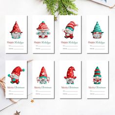 six christmas gift tags with gnomes on them