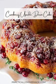 a cranberry upside down cake on a plate with the words cranberry upside down cake