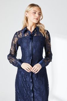 Elegant lace overlay with intricate floral pattern
Collared neckline for a sophisticated touch
Long sleeves with sheer lace detailing
Button-down front for versatile styling
Midi length with a subtle A-line silhouette
This stunning lace shirt dress from Principles is a versatile piece that effortlessly transitions from day to night. The delicate lace overlay creates a romantic and feminine aesthetic, while the collared neckline and button-down front add a touch of classic sophistication. Perfect for formal occasions, this dress can be styled with nude heels and minimal jewellery for a refined look at weddings or race days. For a more casual approach, layer it over a slip dress and pair with ankle boots for an elegant daytime ensemble. The midi length and subtle A-line silhouette flatter Lace Shirt Dress, Occasion Dresses Wedding Guest, Minimal Jewellery, Petite Jumpsuit, Petite Coat, Tall Clothing, Navy Lace, Feminine Aesthetic, Contemporary Outfits