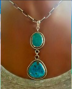 💙Handmade Pendant in Sterling with Two Shades of beautiful Turquoise Cabs - Traditional Style 💙Polished TWO Stone BEAUTY! 💙Tested as Sterling 💙Measures 3" and weighs 21.5 grams 💙Turquoise in a smooth bezel surrounded by twist wire; sterling construction - super neat! Pendant only! Southwestern One-of-a-kind Turquoise Necklace, Reno Nv, Twisted Wire, Handmade Pendant, Handmade Pendants, Turquoise Jewelry, Traditional Style, Reno, Two Tone