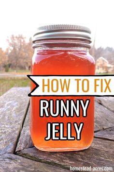 a mason jar with the words how to fix runny jelly on it sitting on a picnic table