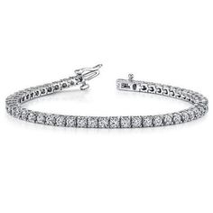 A beautiful real diamond tennis bracelet Carat Weight: 5.00 Ct Round cut Gold Purit and color: 14K White gold (available in rose and white gold) Diamond Color: E Diamond Clarity: VVS2 Natural Gold Weight: 10.0 Grams Bracelet Length: 7 Inches (available to extend) Comes with a reputable GEL apparaisal. Free shipping and free certificate. Bracelet Tennis, Diamond Tennis Bracelet, Single Line, Natural Gold, Women Diamond, Tennis Bracelet Diamond, Natural Earth, Diamond Bracelets, Brilliant Diamond