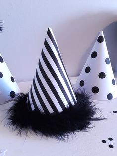 black and white party hats on a table