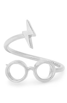 a pair of harry potter's glasses and lightning bolt ring