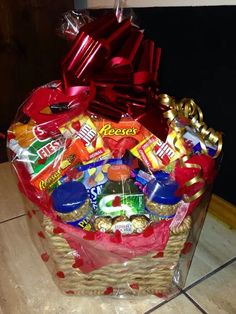 a gift basket filled with candy and candies