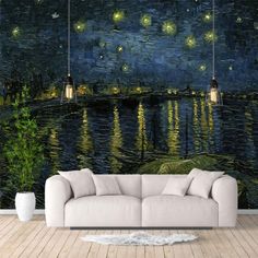 a living room with a couch and large wall mural depicting starr lights over the water