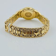 Women's Concord Sarento 24mm Solid 18K Yellow Gold Band Watch, with Roman Numeral Gold Dial, and Diamond Bezel. Includes Mahogany Box. Brand: Concord. Case Back: Solid. Gender: Women's. Condition: Pre-Owned. Dial Color: Yellow Gold. Case Dimensions: 24mm. Bracelet / Strap: Solid Gold. Bracelet Size: 5.3/4 (inches). Bezel Color: 18K Yellow Gold. Condition: Excellent Condition. Movement: Quartz (Movement). Metal Type: 18K Gold Solid Gold. Warranty: 1 Year Limited Warranty. Yellow Gold Watches With Polished Finish And Round Dial, Gold Jewelry And Watches With Polished Finish For Business, Elegant Gold Watch Accessories With Solid Link Construction, Yellow Gold Polished Round Watch, Elegant Gold Watch Accessories With Solid Link, Gold Jewelry With Polished Finish And Round Dial, Formal Gold Diamond Watch With Polished Finish, Gold Diamond Watch For Formal Occasions, Formal Yellow Gold Round Watch Bands