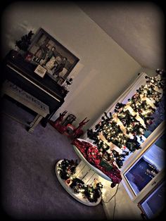 a christmas tree in the corner of a living room