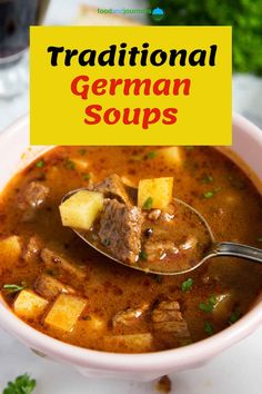 a bowl filled with stew and potatoes on top of a table