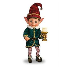 a little elf holding a candle in his hand