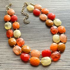 💞One of a kind & ready to ship💞  Shades of Fall! A mix of shades of vintage gold, rich red, seasonal orange, and mustard yellow create a chunky statement look for your favorite season.   About 16 inches long with a 4 inch extender chain. Gold chain and lobster clasp.   *Smoke and pet free home!* I ship 6 days a week!  Thank you for browsing my store! Favorite Season, Chain Gold, Necklace Vintage, Mustard Yellow, Orange Red, Tan Brown, Vintage Gold, Fall Colors, Gold Chains