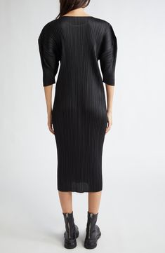 Simple in silhouette, sophisticated in technique—this travel-friendly dress features Issey Miyake's signature garment pleating for a wrinkle-resistant finish. Slips on over head Jewel neck Elbow-length sleeves Unlined 100% polyester Machine wash, dry flat Made in Japan Designer Clothing Asian & Pacific Islander Owned/Founded Pacific Islander, Pleats Please, Pleats Please Issey Miyake, Pleated Midi Dress, Fabric Gift Bags, Jewel Neck, Fabric Gifts, Free Fabric, Elbow Length Sleeve