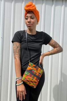 "This beautiful Kente Mini-Crossbody Bag is perfect for all your outings. It features: -42\" leather strap. Dimensions  7\"x 8\"" Multicolor Crossbody Shoulder Bag For On-the-go, Casual Bags With Adjustable Strap, Casual Tote Pouch With Adjustable Strap, Casual Orange Shoulder Bag With Mobile Phone Holder, Casual Orange Shoulder Bag With Phone Holder, Casual Orange Shoulder Bag With Phone Pocket, Adjustable Crossbody Bag For Daily Use, Casual Fashion Shoulder Bag, Casual Pouch Shoulder Bag