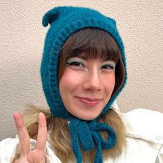 "Hand knitted cat ears balaclava is a new piece of daldandala. This one is made from a super soft and warm blue mohair. It is a wool and acrylic mix material which is not itchy at all.  If you want a comfortable, warm and a unique winter hat, this can be a cute option for you. Perfect gift idea for knit wear and cat lovers. You can request custom orders. Just contact me. I really enjoy making custom balaclavas. For other color options don't forget to check \"knit bonnets\" section. Zero waste: - Recyclable, reusable packaging - Sustainable materials   Care: - Hand wash - Cold water - Do not bleach - Do not iron - Do not use drying machine - Do not hang out, let it dry by laying." Hand Knitted Fitted Winter Bonnet, Fitted Knitted Yarn Bonnet, Blue Hand Knitted Beanie Bonnet, Blue Hand Knitted Bonnet Beanie, Hand Knitted Fitted Yarn Bonnet, Blue Hand Knitted Bonnet, Fitted Hand-knitted Yarn Bonnet, Packaging Sustainable, Knitted Balaclava