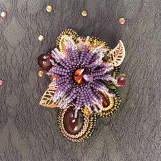 "Valentines Day Gift Brooch aster it is embroidered brooch from Japanese beads with natural stone Agate, Amber, Garnet and crystal. Flower brooch has a size 2.6*1.8 inches (6.5*4.5 cm). Video of this item you can see here https://youtu.be/-URZZ432lr0 Bright, warm flower in the frame of many natural stones and crystals. This is an autumn jewelry, which is perfect as a wedding brooch or brooch for coat This luxury brooch will perfectly complement your unique flower jewelry collection, will be a wo Unique Handmade Flower Brooch, Handmade Flower-shaped Pins For Gifts, Unique Handmade Flower Brooches, Unique Flower Brooches For Jewelry Making, Jewelry Valentines Day, Autumn Jewelry, Spider Jewelry, Embroidered Brooch, Japanese Beads