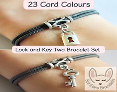 More fab bracelets in my shop  😊 ⤵ www.etsy.com/shop/BatEarsBracelets The 🔑 Key Charm is approx. 17x8mm and the 🔒 Padlock Charm is approx. 14x8mm.  ➿Cord Charm Bracelet - unisex - adults - children - everyone! ➿Made with quality, strong 2mm Micro Paracord. It doesn't fade, it is washable, wearable, durable, fun and smart.  ➿23 Cord Colours to choose from - adjustable with the sliding knots from approx. 12cm to 25cm - one size should fit all! ➿Two bracelets - one with a key and one with a padlock. ♻️ No single use plastic here 😊 🌱cards and envelopes are paper 💚 even the padded envelope is made of paper ♻️ paper packing tape used 🌳reusable gift bag🛍️ 📮 Posted same day if ordered before 1pm Monday - Friday for UK orders. All UK orders will be sent Royal Mail 1st Class. USA orders wil Key Bracelet, Couples Bracelet, Reusable Gift Bags, Couple Bracelets, Letter Charms, Metal Charm, Personalize Bag, Jewelry Pouch, Paracord