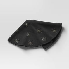 a black tie with silver stars on it