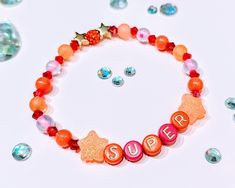 The Super bracelet is bright and pretty featuring orange coral beads, and 2 golden hematite stars :) All orders will always include a PC and for the month of November all orders will include 1 free small gift :) Optional: Please include your bias in the personalization box for an extra freebie! Thank you for looking! :) Joshua Svt Beads Bracelet, Cute Orange Beaded Bracelets, Seventeen Inspired Beaded Bracelet, Seventeen Bracelet, Seventeen Super, Adjustable Orange Flower-shaped Beaded Bracelets, November Month, Orange Coral, Coral Beads