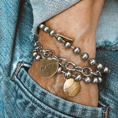 We love our new addition. This listing is for our brass baseball charm bracelet. It's simple, easy and can be worn daily. *Find other bracelets on a different listing.