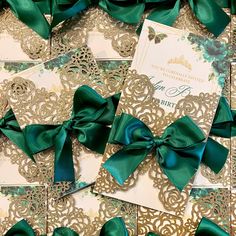 green and gold wedding cards with matching bows