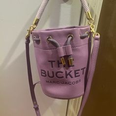 New Without Tags Marc Jacobs Bucket Bag. Comes With Dust Bag Travel Bucket Bag With Branded Hardware, Bucket Shoulder Bag With Branded Hardware, Purple Bucket Bag With Adjustable Strap, Purple Bucket Bag For Travel, Tote Shaped Bucket Bag For Errands, Chic Bucket Bag With Branded Hardware For Errands, Marc Jacobs Bucket Bag, Marc Jacobs Bag, Color Purple