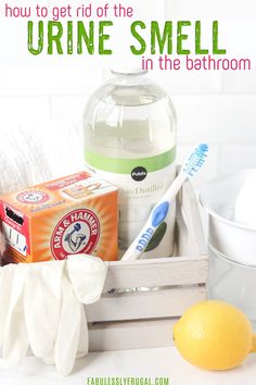 an orange, toothbrush, and soap in a wooden crate with the words how to get rid of the urine smell in the bathroom