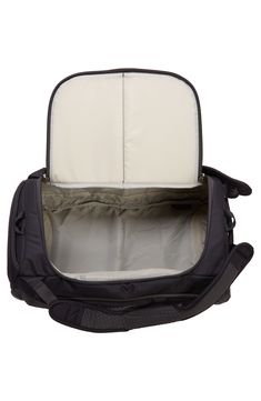 Backpack, over-the-shoulder and grab-and-go carry options make this duffle bag a utilitarian essential for gym, travel and work. Easy-access pockets and a durable, water-repellent finish add to the practical appeal, while bluesign®-certified fabric provides a sustainable element. 15"W x 8"H x 10"D. (Interior capacity: extra large.); 7" -15 1/2" strap drop; 1.3 lb. Two-way zip-around closure Adjustable carry handles with foam padding Exterior zip and water-bottle pockets Durable water-repellent ( Sporty Travel Bag For Outdoor Activities, Black Nylon Duffle Bag For Hiking, Functional Duffle Bag With Pockets For Hiking, Waterproof Functional Duffle Bag Backpack, Functional Waterproof Duffle Bag Backpack, Black Functional Travel Bag For Hiking, Functional Black Travel Bag For Hiking, Functional Luggage For Outdoor Activities, Outdoor Nylon Travel Bag