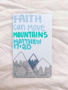 a book with the title faith can move mountains written on it