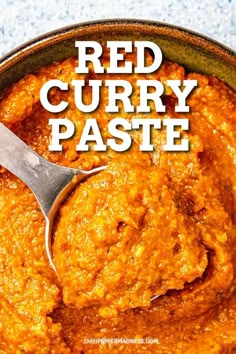 red curry paste in a bowl with a spoon