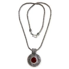 This exquisite necklace pays tribute to ancestral Indonesian design. Handcrafted of sterling silver, it features luxurious tendrils surrounding a gem and a finely woven chain. Buana centers the pendant with carnelian's passionate fire. Carnelian represents the birthstone of July. .925 Sterling silver Pearl Cocktail Ring, Red Pendant, Carnelian Necklace, Red Pendants, Woven Chain, Luxury Necklace, Silver Work, Sterling Silver Necklace Pendants, Sterling Silver Cuff