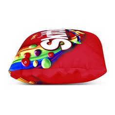 a red bean bag filled with lots of candy