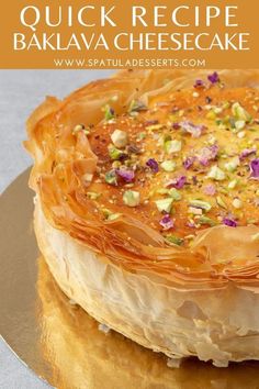 a close up of a cake on a plate with the words quick recipe bakava cheesecake