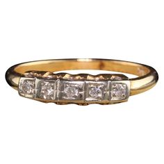 Beautiful Antique Art Deco 14K Yellow Gold Five Stone Single Cut Diamond Wedding Band. This art deco wedding band has 5 single cut diamonds set in 14k yellow gold and white gold top. Item #R0950 Metal: 14K Yellow Gold and White Gold Top Weight: 1.6 Grams Diamond: Approximately .10 cts Color: H Clarity: SI1 Ring Size: 5 1/2 Measurements: Top measures 3.73 mm wide and band measures 1.77 mm wide. Measurement from finger to top of ring: 2.69 mm Layaway: For your convenience, we will be happy to prov Art Deco Wedding Band, Deco Wedding, Art Deco Wedding, Gold Top, Art Deco Diamond, Diamond Wedding Band, Antique Art Deco, Antique Art, Diamond Wedding Bands