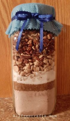 a jar filled with food sitting on top of a table