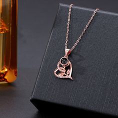 This is a mysterious necklace, Personalized for the moment you love most on a projection necklace! Engraved love never fades, and treasured memory will always be with you. Carry your Little cute photo hidden in the pendant, You can see the photo inside the pendant, or you can use it to illuminate the light and project your photo on the wall. The best dreamy gift for yourself and family, and friends.

Customize Your Picture Projection Necklace

You can freely customize anything you like, including people, pets, scenery, and even symbol, and attach text as a souvenir. Please try to upload photos with high resolution, the higher the resolution, the more obvious the product effect.

Meaningful Accessory & Memorial Gift

This customized projection necklace engraved with your favorite photo will Black Jewelry For Anniversary, Mother's Day Gift, Black Jewelry For Anniversary Gift On Mother's Day, Black Jewelry For Anniversary And Mother's Day, Black Necklaces For Anniversary And Mother's Day, Black Necklaces For Anniversary Gift On Mother's Day, Black Necklaces For Mother's Day Anniversary Gift, Black Heart Pendant Jewelry For Anniversary, Black Jewelry For Mother's Day Gift, Slide Projector