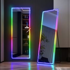 two mirrors that have been lit up with different colors and shapes, one in the shape of a rectangle