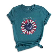 a women's t - shirt with an american sunflower design on the front